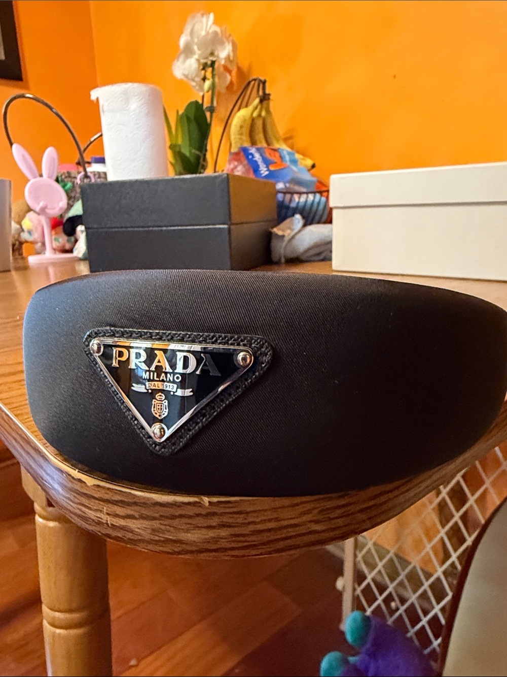 Prada Black Logo Headband with Triangle Plaque model comfortable, and luxury